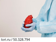 surgeon with heart. High resolution photo. surgeon with heart. High quality photo. Стоковое фото, агентство Ingram Publishing / Фотобанк Лори