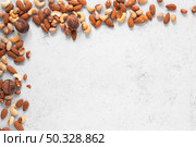 top view nuts concept with . High resolution photo. top view nuts concept with . High quality photo. Стоковое фото, агентство Ingram Publishing / Фотобанк Лори