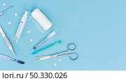 overhead view medical equipment s blue background. High resolution photo. overhead view medical equipment s blue background. High quality photo. Стоковое фото, агентство Ingram Publishing / Фотобанк Лори
