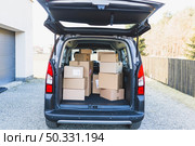 delivery car trunk boxes. High resolution photo. delivery car trunk boxes. High quality photo. Стоковое фото, агентство Ingram Publishing / Фотобанк Лори