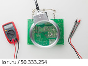 close up circuit board repair. Стоковое фото, агентство Ingram Publishing / Фотобанк Лори