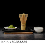 front view matcha tea with bamboo whisk. Стоковое фото, агентство Ingram Publishing / Фотобанк Лори