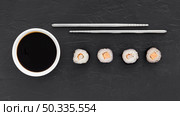 top view tasty sushi rolls with soy sauce. Стоковое фото, агентство Ingram Publishing / Фотобанк Лори