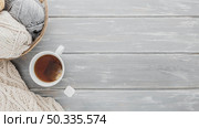 top vire tea cup yarn with copy space. Стоковое фото, агентство Ingram Publishing / Фотобанк Лори