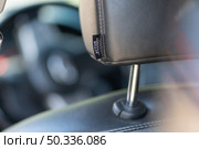 Close-up of leather car headrest. Element of design. Стоковое фото, агентство Ingram Publishing / Фотобанк Лори