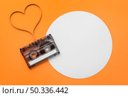 cassette tape with magnetic recording film heart shape. Стоковое фото, агентство Ingram Publishing / Фотобанк Лори