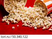 heap popcorn spilled from buckets. Стоковое фото, агентство Ingram Publishing / Фотобанк Лори