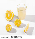 lemon slices juice high angle. Стоковое фото, агентство Ingram Publishing / Фотобанк Лори