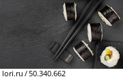 sushi rolls with chopsticks copy space. Стоковое фото, агентство Ingram Publishing / Фотобанк Лори