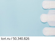 top view sanitary towel line. Стоковое фото, агентство Ingram Publishing / Фотобанк Лори