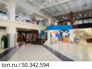 blurred indoor shopping center. Стоковое фото, агентство Ingram Publishing / Фотобанк Лори