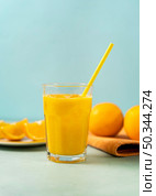 delicious drink glass with straw. Стоковое фото, агентство Ingram Publishing / Фотобанк Лори