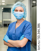 female doctor hospital with mask. Стоковое фото, агентство Ingram Publishing / Фотобанк Лори