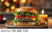 Delicious burger and French fries in home kitchen with Christmas decor, lights of garland. Delivery from fast food restaurant, menu burger home cooking for New year. AI generated; Стоковое AI-видео, аниматор Ольга Симонова / Фотобанк Лори