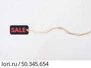 label with sale inscription cord. Стоковое фото, агентство Ingram Publishing / Фотобанк Лори