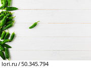 mexican food concept with green peppers copyspace. Стоковое фото, агентство Ingram Publishing / Фотобанк Лори