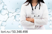 medium shot woman with medical background. Стоковое фото, агентство Ingram Publishing / Фотобанк Лори