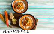 OLYMPUS DIGITAL CAMERA. spices near bowls with curry. Стоковое фото, агентство Ingram Publishing / Фотобанк Лори