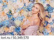 young woman standing blouse with bare shoulders. Стоковое фото, агентство Ingram Publishing / Фотобанк Лори