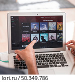 laptop with spotify app. Стоковое фото, агентство Ingram Publishing / Фотобанк Лори