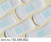 sanitary towels background. Стоковое фото, агентство Ingram Publishing / Фотобанк Лори