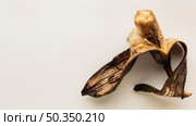 leftover food waste old banana peel. Стоковое фото, агентство Ingram Publishing / Фотобанк Лори