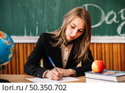 young teacher working class. Стоковое фото, агентство Ingram Publishing / Фотобанк Лори