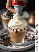 close up glass coffee with cream. Стоковое фото, агентство Ingram Publishing / Фотобанк Лори