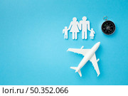top view paper cut family concept with compass. Стоковое фото, агентство Ingram Publishing / Фотобанк Лори