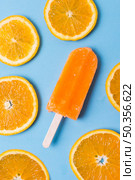 homemade popsicle ice cream slices orange. Стоковое фото, агентство Ingram Publishing / Фотобанк Лори