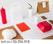 packed food with disposal cup sauce bottle white background. Стоковое фото, агентство Ingram Publishing / Фотобанк Лори