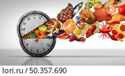 Intermittent fasting concept and calorie restriction or autophagy diet symbol nutrition concept and binge eating disorder with an open clock icon releasing food with 3D illustration elements. Стоковое фото, агентство Ingram Publishing / Фотобанк Лори