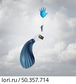 Medical solution concept and the symbol for life saving Hospital care as a surgical glove balloon or healthcare insurance saving a failing situation with 3D illustration elements. Стоковое фото, агентство Ingram Publishing / Фотобанк Лори
