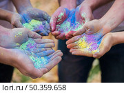 close up multiple hands holding powder color. Стоковое фото, агентство Ingram Publishing / Фотобанк Лори
