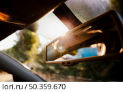 close up rearview mirror sunshine. Стоковое фото, агентство Ingram Publishing / Фотобанк Лори