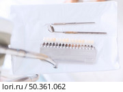 teeth shades other dental tools. Стоковое фото, агентство Ingram Publishing / Фотобанк Лори