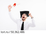 graduating man shouting. Стоковое фото, агентство Ingram Publishing / Фотобанк Лори