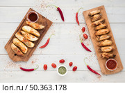 sauces spices near fried chicken potatoes. Стоковое фото, агентство Ingram Publishing / Фотобанк Лори