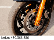 motorbike wheel closeup view. Стоковое фото, агентство Ingram Publishing / Фотобанк Лори
