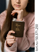 front view woman reading new testament. Стоковое фото, агентство Ingram Publishing / Фотобанк Лори