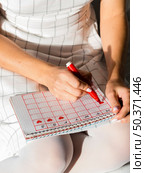 high view calendar with menstruation period. Стоковое фото, агентство Ingram Publishing / Фотобанк Лори