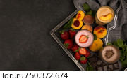 assortment milkshake glasses tray with fruits chocolate . Стоковое фото, агентство Ingram Publishing / Фотобанк Лори