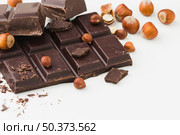chocolate bar plain background. Стоковое фото, агентство Ingram Publishing / Фотобанк Лори