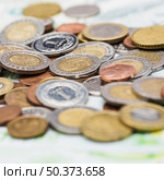 close up metallic coins. Стоковое фото, агентство Ingram Publishing / Фотобанк Лори