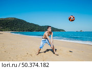 guy receiving volleyball. Стоковое фото, агентство Ingram Publishing / Фотобанк Лори