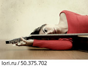 Girl with a guitar, "grain and texture added" Стоковое фото, агентство Ingram Publishing / Фотобанк Лори