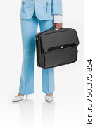 Business active woman standing over a white background with a briefcase in her arms. Стоковое фото, агентство Ingram Publishing / Фотобанк Лори