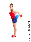 Beautiful young woman posing with a beach ball. Стоковое фото, агентство Ingram Publishing / Фотобанк Лори