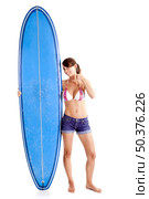 Beautiful young woman posing with a surfboard, isolated on white. Стоковое фото, агентство Ingram Publishing / Фотобанк Лори