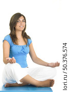 Beautiful woman meditating . Стоковое фото, агентство Ingram Publishing / Фотобанк Лори